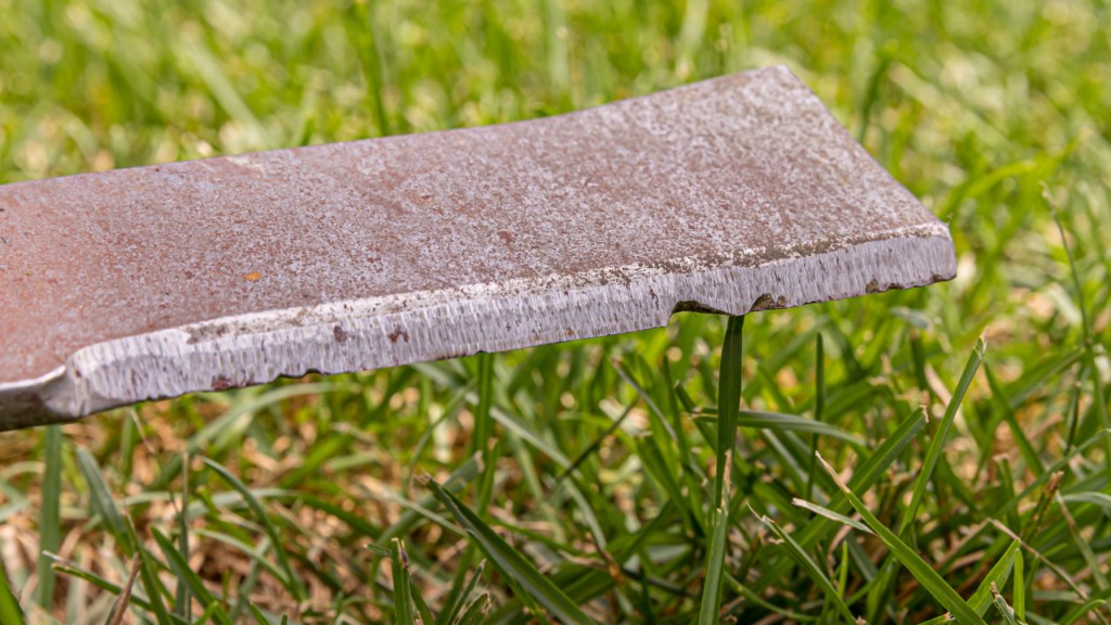 An example of a dull and damaged mower blade